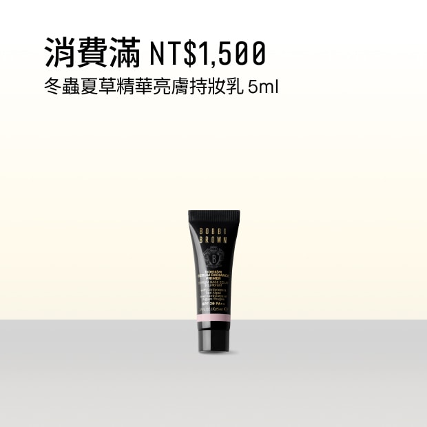 Model applying Skin Long-Wear Weightless Foundation to skin with a foundation brush